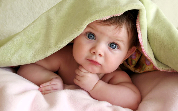 Ребенок в одеяле